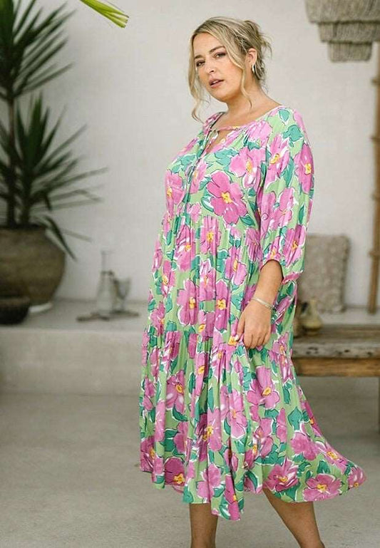 Lis Dress- by Freez at Koko & Layla – 100% rayon, V-neck with tie, half balloon sleeves, tiered skirt, side pockets, versatile women’s dress.”